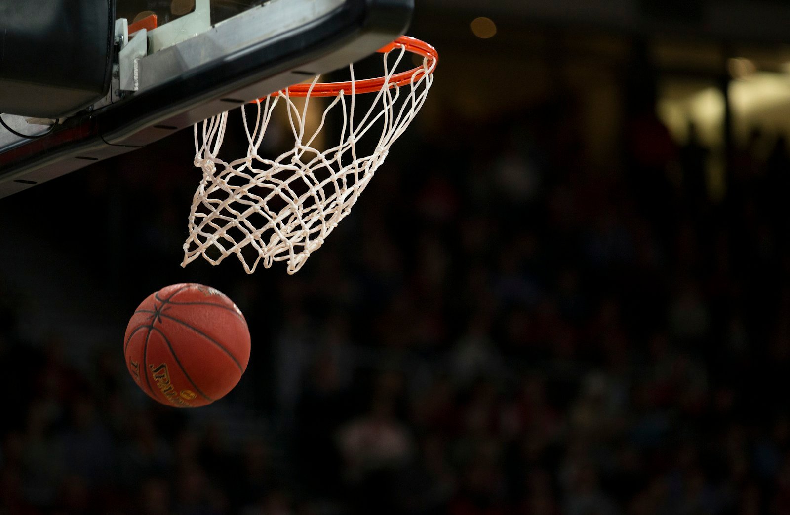 Basketball at the hoop during a game